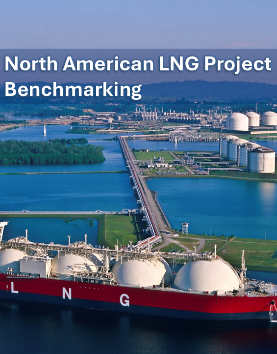 Aerial view of a liquefied natural gas (LNG) terminal with storage tanks and an LNG carrier ship docked at the facility.