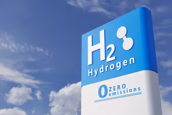 A sign that says h2 hydrogen on a blue background.